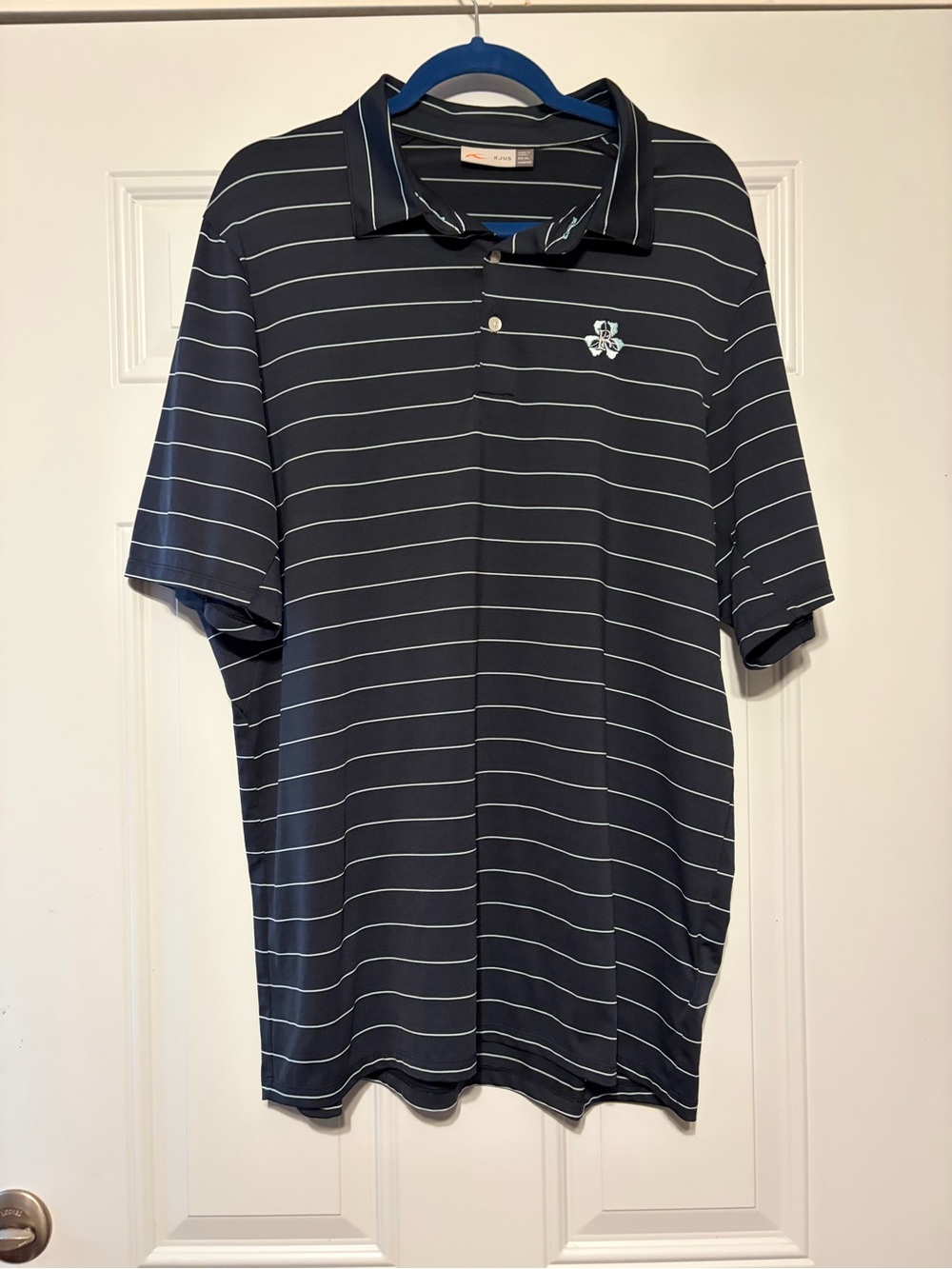 Striped Navy Performance Polo with Subtle Logo